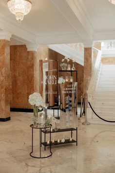 the lobby is clean and ready to be used for business or wedding guests, as well as flower centerpieces