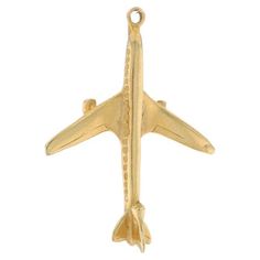 Metal Content: 14k Yellow Gold Theme: Airplane, Air Traveler's Gift, Pilot Flight Attendant Measurements Tall (from stationary bail): 1 5/32" (28.8mm) Wide: 7/8" (21.9mm) Interior of top bail opening measures (east to west): 1.1mm Weight: 1.8 Grams Stamps: 14k Condition: Pre-Owned Professionally tested to guarantee metal content. Gold Theme, Flight Attendant, Flight, Travel Gifts, Metallica, Jewelry Bracelets, Charm Bracelet, Yellow Gold, Yellow