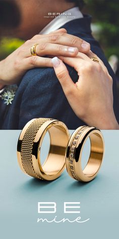 two gold wedding rings with the words be mine written in white lettering on them and an image of a couple holding each other's hands