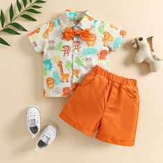 Boy Graphic Animal Print Orange Shorts Outfit - Momorii Cute Collared Shirt For Summer, Cute Collared Summer Shirt, Orange Cotton Summer Shirt, Summer Orange Cotton Shirt, Playful Graphic Print Shorts For Summer, Playful Graphic Print Summer Shorts, Playful Graphic Print Summer Sets, Playful Graphic Print Sets For Summer, Summer Sets With Cartoon Print And Shorts