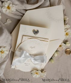 Are you looking for a luxurious and elegant wedding invitation suite that will leave your guests in awe? Look no further than our Fine Art Embossed Blind Ivory Gold Wedding Invitation. This stunning invitation features intricate details and a beautiful blind embossed floral design in gold, creating a sophisticated and timeless look. For those who prefer a touch of glamour, our Golden Deboss Floral Wedding Invitation is the perfect choice. The debossed floral pattern in gold adds a touch of opule