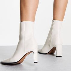 Off White Square Toe Ankle Boots. Would Look Amazing With A Turtleneck Sweater Dress And Pea Coat Or A “Shades Of White/Neutral” Outfit. Depending On How You Style It Can Go Rich Housewife/Mod/Corporate Baddie/Quiet Luxury. Never Worn But I Did Notice A Small Scuff On The Heel So Wanted To Point It Out To You (Yellow Arrow). Note: This Boot Has A Fairly Narrow Shaft So Not Big Calf Friendly. It Is Pretty Snug On Me But I Didn’t Return It Bc I Still Thought It Was Cute . Size 11 | 3.5” Heel White High Heel Faux Leather Boots, White Faux Leather High Heeled Boots, Trendy White Square Toe Heeled Boots, White Faux Leather Heeled Boots With Square Toe, White Block Heel Boots For Winter, White Faux Leather Square Toe Heeled Boots, White Faux Leather Heeled Boots For Winter, Fitted White Heeled Boots With Reinforced Heel, Fitted White Heeled Boots For Spring