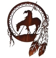 a native american dream catcher with a horse on it's back and spirit written in the center