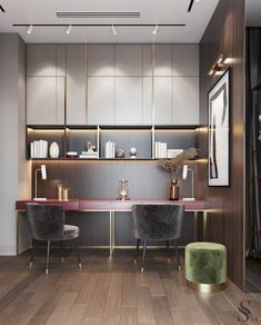 an elegant dining room with two chairs and a table in front of a wall mounted bookshelf