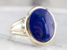 This vintage ring dates to the 1940s and has a handsome geometric, all in highly polished green gold! Particularly nice is the oval- cut lapis cabochon center, original to the piece, which makes this a truly treasured estate piece! Metal: 14K Green Gold Gem: Lapis Gem Measurements: 12.5 x 15.5 mm, Oval Ring Size: 10.50 Marks: "14" Stamped on the inside band Yellow Gold Sapphire Ring, Lapis Jewelry, Lapis Ring, Lapis Lazuli Ring, Cameo Ring, Cabochon Ring, Oval Ring, Vintage Ring, Ring Ring