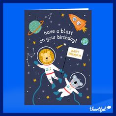 a birthday card with an astronaut and cat