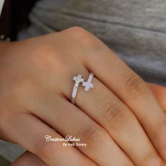 This double cross wrap ring will be crafted from precious metals of your choice:  10K Gold, 14K Gold or 18K gold. Choose Cubic Zirconia Stones or Diamonds. Perfect for everyday wear and beautiful gift for any occasion. Metal options: * 10K gold (yellow, rose or white) * 14K gold (yellow, rose or white) * 18K gold (yellow, rose or white) Sizes: 5 to 11 Ring is slightly adjustable for comfort fit. Please write your ring size in personalization instructions. ----------PRODUCTION TIME----------- All Diamond Cross Ring For Gift, Diamond Cross Rings For Gifts, Cross-shaped Diamond Ring For Gift, White Gold Cross-shaped Promise Ring, Adjustable Cross-shaped Ring For Anniversary, Minimalist Cross Ring For Anniversary, Anniversary White Gold Cross Rings, White Gold Cross Ring Gift, Sterling Silver Cross Ring For Promise