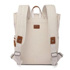 The Sunny Trail Canvas Backpack merges style with practicality, ideal for any journey. Handcrafted from 100% cotton canvas with genuine leather accents, it offers durability and sophistication. Eco-friendly features include recycled nickel-free hardware and vegetable-based dyes. The design combines functionality with aesthetic appeal, making it versatile for any outfit. | TSD Brand Sunny Trail Backpack, Ivory Trail Backpack, Leather Accents, Canvas Backpack, Sunnies, Cotton Canvas, Recycling, Genuine Leather, Eco Friendly, Backpacks