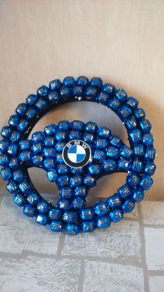 the blue beaded bmw logo is on display