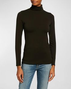 This Soft Touch Long-Sleeve Turtleneck from Majestic Filatures is the perfect mix of coziness and style. Crafted from a viscose-wrapped elastane that delivers four-way stretch and antimicrobial comfort, this top hugs your curves for an on-trend look. The turtleneck and long sleeves keep you warm while staying breathable. Wear it for lounging or pair it with your favorite jeans for an effortlessly cool Instagram selfie. Best of all, the anti-pill fabric means it stays just as soft after many wash Stretch Elastane Long Sleeve Top For Fall, Stretch Elastane Tops For Fall, Second-skin Turtleneck Tops For Fall, Second-skin High Neck Top For Fall, Fitted Long Sleeve Elastane Top For Winter, Versatile Fitted Funnel Neck Top, Fitted Funnel Neck Versatile Top, Winter Fitted Long Sleeve Top In Elastane, Fitted Long Sleeve Top For Winter