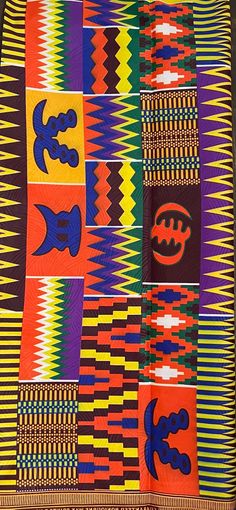 a multicolored blanket with different designs on it