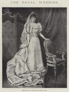 an old photo of a woman in a wedding dress