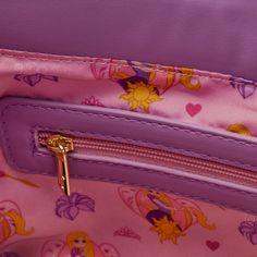 The Loungefly Rapunzel Princess Scene Crossbody Bag tells the story of the lost princess’ illuminating journey, with each panel of the bag displaying a unique scene from the beloved animated feature film. Turn the bag around to see inspiring moments from Rapunzel’s adventures, including a romantic boat ride with Flynn Rider, Rapunzel’s first trip out of the tower, and conversations with friends and family. Perfect for exploring, this crossbody bag will keep your treasures safe as you travel the Disney Crossbody Bags For Disney Trips, Disney Style Crossbody Bags For Disney Trips, Disney Rectangular Shoulder Bag For Travel, Disney Style Rectangular Shoulder Bag For Travel, Disney Style Shoulder Bag With Removable Pouch, Disney Style Shoulder Bag For Travel, Disney Travel Bags With Detachable Strap, Disney Style Travel Shoulder Satchel Bag, Disney Shoulder Bag With Removable Pouch For Travel