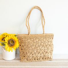 In Stock Fast Shipping From Los Angeles Add a touch of whimsy to your summer wardrobe with Straw Woven Fashion Bag. Made from lightweight straw, this bag features a playful floral design and a convenient zipper closure. Stay stylish and carefree all season long!Inside pocketDimensions: 14"H x 10"W x 4"DZipper closureStrap drop length: 12.5 inches Designer Style ID: 8669 Straw Woven Tote Bag, Retro Vibes, Summer Bag, Everyday Shoulder Bag, Beach Bag Spring Jute Beach Bag With Adjustable Strap, Spring Jute Beach Bag For Daily Use, Spring Beach Bag For Daily Use, Summer Flower Shoulder Bag For Everyday Use, Summer Floral Shoulder Bag For Everyday Use, Spring Straw Crochet Bag For Daily Use, Spring Crochet Woven Bag For Everyday Use, Spring Crochet Bag For Everyday, Casual Flower Shaped Shoulder Bag For Summer