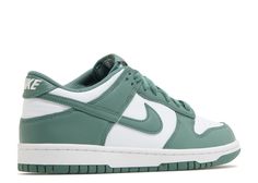 The Nike Dunk Low "Bicoastal" (GS) is a stylish and vibrant addition to Nike's lineup for 2024. This grade school sneaker features a distinctive colorway with spruce green overlays that contrast sharply with the white base. The design includes the classic Nike Swoosh and branding on the tongue, further emphasizing its sporty appeal. The look is completed with a white midsole and a durable spruce green rubber outsole, providing both aesthetic appeal and functionality. The "Bicoastal" is noted for Dunk Verte, Dunks Low, Nike Swoosh, Grade School, Nike Dunk Low, Dunk Low, Nike Dunk, Winter Sale, Nike Jordan