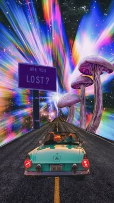 a car driving down a road next to a mushroom like structure with a sign that says are you lost?