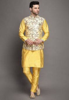 Art Silk Kurta in YellowThis Readymade attire is Enhanced with Resham and Zari Work. Crafted in Chinese Collar Neck and Full SleeveAvailable with an Art Silk Pant in Yellow and an Art Silk Nehru Jacket in CreamDo note: Brooch and Footwear shown in the image is for presentation purposes only. Half to one inch may vary in measurement. (Slight variation in actual color vs. image is possible) We sell all kinds of menswear. Mens Kurta | Mens Kurta Pajama | Mens Sherwani | Mens Sherwani Sets | Traditi Spring Bandhgala With Floral Embroidery, Spring Floral Embroidery Bandhgala, Spring Nehru Jacket With Resham Embroidery, Spring Embroidered Bandhgala With Traditional Drape, Spring Embroidered Traditional Bandhgala, Spring Bandhgala With Intricate Embroidery And Traditional Drape, Festive Nehru Jacket With Floral Embroidery And Stand Collar, Spring Bollywood Bandhgala With Floral Embroidery, Spring Floral Embroidered Bollywood Bandhgala