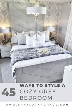 a bedroom with gray and white bedding