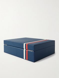 Your most prized timepieces deserve to be housed somewhere special. Offering space for up to eight watches, Rapport London's 'Greenwich' box is handcrafted from blue full-grain leather with red and white stripes that nod to the Union Jack. The plush suede interior and cushioned rolls keep every piece safe and secure. Modern Blue Rectangular Watch Accessories, Rectangular Blue Watch Accessories For Gift, London Greenwich, Watch Box For Men, Leather Watch Roll, Mens Watch Box, Leather Watch Box, Watch Roll, Watch Winder