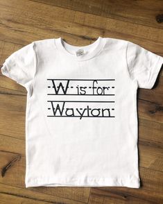 a white t - shirt with the words w is for wayton printed on it