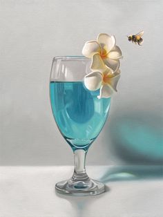 a painting of a glass with blue liquid and white flowers in it, next to a bee