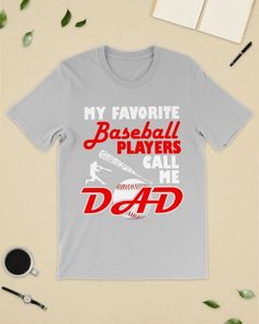 a t - shirt that says, my favorite baseball players call me dad on it