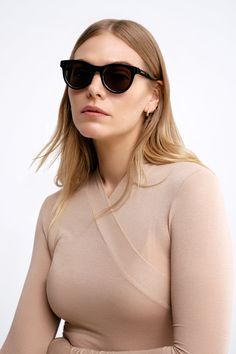 Introducing our Venice Sunglasses, boasting sleekly rounded acetate frames and a comfortable fit, she will be an indispensable companion for sunny days in the city or for completing your vacation looks. | Available in one size. Lens width is approximately .2” (5 cm). Temple length is approximately 5.5" (14.5 cm).100% Acetate frames. Tinted lenses offer UV protection. Includes a travel carrying case. To clean, rinse with water and wipe with a microfiber cloth as needed. For long-lasting quality, Chic Cat Eye Sunglasses For Day Out, Chic Cat Eye Sunglasses With Tinted Round Frame, Chic Cat Eye Sunglasses With Mirrored Round Frame, Chic Cat Eye Sunglasses With Round Mirrored Lenses, Chic Cat Eye Sunglasses With Mirrored Lenses, Elegant Polarized Cat Eye Sunglasses For Day Out, Sleek Polarized Sunglasses For Summer, Elegant Cat Eye Sunglasses For Day Out, Chic Everyday Sunglasses With Polarized Lenses