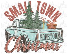 a blue truck with a christmas tree in the back and santa town written on it