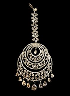 CZ maang teekha for Indian women on bridal occasions Luxury White Meenakari Tikka, Elegant Luxury Tikka For Diwali, Luxury Tilla Tikka For Celebration, Elegant Luxury Tikka With Stone Work, Bollywood Style Round Tikka With Stone Work, Luxury White Traditional Tikka, Luxury Silver Tikka For Diwali, Luxury Silver Kundan Tikka, Round Cutdana Tikka For Temple Jewelry