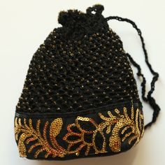 Nwt Black Sequined Hand Crocheted Beaded & Lined Potli Style Bag / Pouch. Pairs Well With Formal & Party Style Dresses. Handcrafted Piece. Wardrobe Classic From Vintage, Retro Till Present Styles. Adds Fun Flirty Look To Any Formal Dress. Great For Flapper, Retro, Disco, Ethnic Party Themes. Brand New With Tag Attached ( Nwt ). Measurement - 7" Length By 6-1/2" Width Color - Black Base With Golden Beads & Sequins Lace Lining Material - Cotton Beaded Potli Bag For Party, Beaded Pouch Potli Bag, Bohemian Embellished Potli Bag As Gift, Bohemian Embellished Potli Bag For Party, Beaded Evening Bag For Festivals, Traditional Beaded Potli Bag For Formal Events, Embellished Black Bags For Festivals, Black Embellished Bags For Festivals, Elegant Beaded Crochet Bag