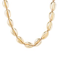 This natured inspired necklace with Cowrie shell inspired detailing is elegant and chic, whilst giving a nod to its bohemian roots. The high polished finish radiates with a metallic shine. The versatility of this necklace means it looks great with a paired down casual look, or as a choker with a little black dress. A definite holiday essential. 22ct gold plated.  Ideal for those who love statement jewellery. A holiday and vacation essential. Pair with our matching coral earrings. Coachella festi Elegant Silver Shell Necklace For Beach, Elegant Silver Shell Beach Necklace, Elegant Strand Necklace, Elegant Gold Strand Jewelry, Elegant Silver Jewelry For Vacation, Elegant Shell-shaped Necklace For The Beach, Elegant Silver Strand Jewelry, Elegant Silver Necklace For Beach, Elegant Gold Strand Necklace