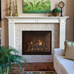 a living room with a fire place and couches