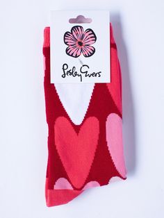 Who doesn't love a pair of cute patterned socks? We definitely do! We're super excited to announce the arrival of these adorable socks to our collection. They make a sweet little gift or simply a treat for yourself. Trust me, you won't want to miss out on these charming designs to add some fun to your sock drawer! Click here for socks 4-pack! SOCK DETAILS: Custom knit pattern Textile designed by Lesley Imported 41% Cotton, 48% Nylon, 10% Polyester, 1% Lycra Not eligible for returns or exchanges Pink Novelty Socks For Gift, Red Heart Socks, Heart Pattern Socks, Red Non-slip Comfortable Socks, Heart Socks, Sock Drawer, Patterned Socks, Super Excited, Textile Patterns