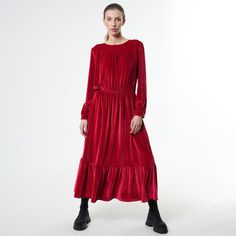 With a fit and flare silhouette, this long sleeved velvet dress is an outfit worth having.  The waist is elasticated and very comfortable for a long-day wear and the style of the dress gives you the opportunity to wear it on different occasions. Based on the accessories you choose to pair it with, this loose autumn dress can look casual or formal. This garment closes with a button at the neck. MATERIAL: 90% polyester, 10% spandex  CARE: Dry clean only. Never iron. Use steam to remove wrinkles. Red Winter Dress, Red Winter Dresses, Velvet Dress Long Sleeve, Long Velvet Dress, Red Casual Dress, Sleeved Velvet Dress, Velvet Dress Long, Long Sleeve Velvet Dress, Red Velvet Dress