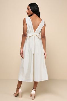 Elegant Destiny Cream Sleeveless Bow Midi Dress Chic Sleeveless Midi Dress For Wedding, Sleeveless Midi Dress For Bridesmaids, Sleeveless Tie Back Midi Dress For Wedding, Elegant Sleeveless Midi Dress With Tie Back, Silk Sleeveless Maxi Dress With Tie Back, Chic Satin Sleeveless Bridesmaid Dress, White Sleeveless Midi Dress With Tie Back, Tie-back Sleeveless Dress For Date Night, Knee-length Satin Sleeveless Dress For Summer