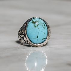 Classic style Indonesian ring in sterling silver with an oval Chrysocolla stone. This vibrant blue ring looks great on any finger for both women and men. Chrysocolla is a copper stone that resonates with the vibrations of the Earth and helps clear blockages from the throat chakra. It promotes clear communication and the courage to express oneself. Available in Gold Brass https://etsy.me/2msAubC Ring Size Available in all sizes. Please be sure to find your exact ring size for the finger you want Classic Silver Oval Turquoise Ring, Classic Turquoise Signet Ring As Gift, Blue Oval Cabochon Ring Stamped 925, Classic Oval Turquoise Ring, Blue Oval Cabochon Signet Ring With Polished Finish, Oval Turquoise Signet Ring In Sterling Silver, Oval Turquoise Sterling Silver Signet Ring, Turquoise Oval Sterling Silver Signet Ring, Classic Blue Turquoise Ring In Sterling Silver