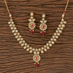 ZohraArts Gold-Plated Indian Jewelry kundan Choker Set with Necklace and Earrings. Indian Bridal Traditional Jewelry Sets. Very Gorgeous and elegant one 24 k thick micron gold plated dainty Polki necklace set Comes with matching earrings Earrings: Pushback Necklace Closure: adjustable via a handmade chord ( slide lock) Highest quality and craftsmanship Ready to ship from New Jersey, United States Kundan Pearl Necklace With Meenakari For Puja, Traditional Ruby Kundan Necklace For Celebration, Bollywood Style Ruby Kundan Necklace, Bollywood Kundan Pearl Necklace For Puja, Bollywood Style Ruby Necklace With Meenakari, Festive Ruby Necklace With Decorative Meenakari, Kundan Jewelry Sets For Puja, Red Kundan Jhumkas With Zari Work, Hand Set Kundan Necklace For Puja