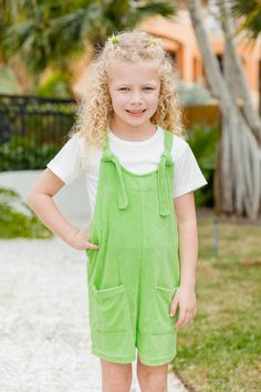 Details Lime Terry Romper Fabric is stretchy Adjustable straps, pockets Pair this romper over swim! Unlined Size 7/8 from shoulder to hem: 26" Material and Care 80% viscose 20% polyester Machine wash cold, no drum drying Patterns may vary Materials may have natural variations Colors may vary from different viewing devices. Green Summer Shortalls Overalls, Summer Shortalls For Beach, Summer Beach Shortalls Overall, Summer Beach Shortalls, Beach Style Summer Shortalls, Solid Color Jumpsuits And Rompers For Summer Playwear, Green Jumpsuits And Rompers With Pockets For Vacation, Green Jumpsuits With Pockets For Vacation, Green Vacation Jumpsuits With Pockets