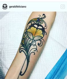 a woman's arm with a tattoo on it