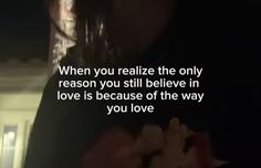 a person holding food in their hands with the words when you realize the only reason you still believe in love is because of the way you love