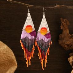 A fun vibrant beautiful beads tassel drop Earrings with sun, sunset & mountains, perfect for summer/spring. They will make any outfit pop! Summer Beaded Fringe Dangle Earrings, Summer Beaded Tassel Drop Earrings, Multicolor Beaded Earrings For Summer Vacation, Summer Beaded Fringe Tassel Dangle Earrings, Summer Beaded Fringe Tassel Earrings, Dangle Beaded Fringe Tassel Earrings For Beach, Summer Tassel Earrings With Round Beads Fringe, Summer Beaded Fringe Drop Earrings, Summer Beach Tassel Earrings With Beaded Fringe