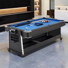 a pool table in the middle of a living room