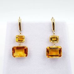 14K Yellow Gold Lever Back Drop Earrings Four Genuine Citrine Rectangle shape Stones Closure: Lever back  Earrings height: 1.3 inches (34mm) Earrings Width: 0.5 inches (14 mm) Size Stone 1: 8x6mm Size Stone 2: 14x10mm Total Weight of earrings: 3.4 grams Made in Canada Comes in a Beautiful Gift Box, Perfect for Gifting ------------------------------------------------ * Please click here to visit my shop: https://www.etsy.com/shop/bestjewelryset * To see more earrings please check out the link bel Yellow Gold Citrine Dangle Earrings, Anniversary Citrine Drop Earrings, Gold Topaz Earrings With Gemstone Accents, Gold Citrine Earrings With Gemstone Accents, Earrings Luxury, Citrine Earrings, Back Drop, Natural Citrine, Beautiful Gift Boxes