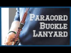 a person holding a wooden beaded necklace with the words paracord buckle lanyard