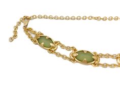 Accessorize with a touch of elegance with our Tink Chain Belt. Crafted with a matte gold chain and light green stones in a unique design, this belt adds a luxurious and exquisite touch to any outfit. Its clasp closure ensures a secure fit, while its stylish and unique look is sure to make a statement. Details: Clasp closure Light Matte Green Stones Matte Gold Italian chain Made in the USA