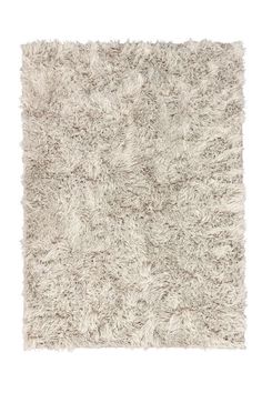 a white rug on a white background