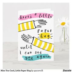 there's a little paper hug until i can see you again card with flowers in the background