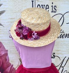 Boater hat with a straight crown and wide brim. Made with straw and braided natural fibers. Trimmed with burgundy tulle and decorated with fabric flowers and rhinestone applications in maroon, burgundy, mauve and lilac tones. Adjustable interior strap. Measurements: Cup height 10 cm, brim width 7 cm. Adjustable inner circumference from 56 to 58 cm. *Can be made in smaller custom measurements The flower bouquets of our articles are made completely by hand, creating each flower petal by petal and Burgundy Wide Brim Hat For Summer, Burgundy Curved Brim Summer Hat, Burgundy Summer Hat With Curved Brim, Summer Burgundy Hat With Curved Brim, Summer Burgundy Curved Brim Hat, Purple Brimmed Summer Fascinator, Summer Purple Fascinator, Purple Summer Fascinator, Purple Mini Hat For Summer Beach