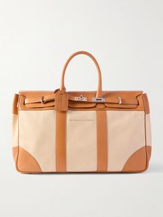 Brunello Cucinelli's weekend bag will make the perfect carry-on, whether you're travelling for business or leisure. It's been made in Italy from panels of full-grain leather and has a twist-lock front flap to keep your luggage secure. Inside, there's space enough for a few outfits, plus any technology you might need. Luxury Beige Duffle Bag, Luxury Beige Travel Bag, Luxury Weekender Bag With Leather Handles For Weekend Trips, Designer Bags With Leather Trim For Weekend Trips, Luxury Beige Tote Travel Bag, Luxury Beige Rectangular Weekender Bag, Luxury Travel Bag With Leather Trim For Weekend Trips, Luxury Travel Bag With Leather Handles For Weekend Trips, Luxury Luggage With Leather Trim For Overnight Trips