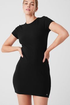 Simple, easy, and oh-so cute, the Goddess Ribbed Short Sleeve Dress is made from a soft, stretchy ribbed fabric that smooths and supports for a perfect fit. It has a classic crewneck, short sleeves and a mini-length hem. Wear it on the weekend, on vacation, to hang around the house… It works just about anywhere. Ribbed Shorts, Ribbed Mini Dress, The Goddess, Short Sleeve Dress, Alo Yoga, On Vacation, Ribbed Fabric, The Weekend, Sleeve Dress